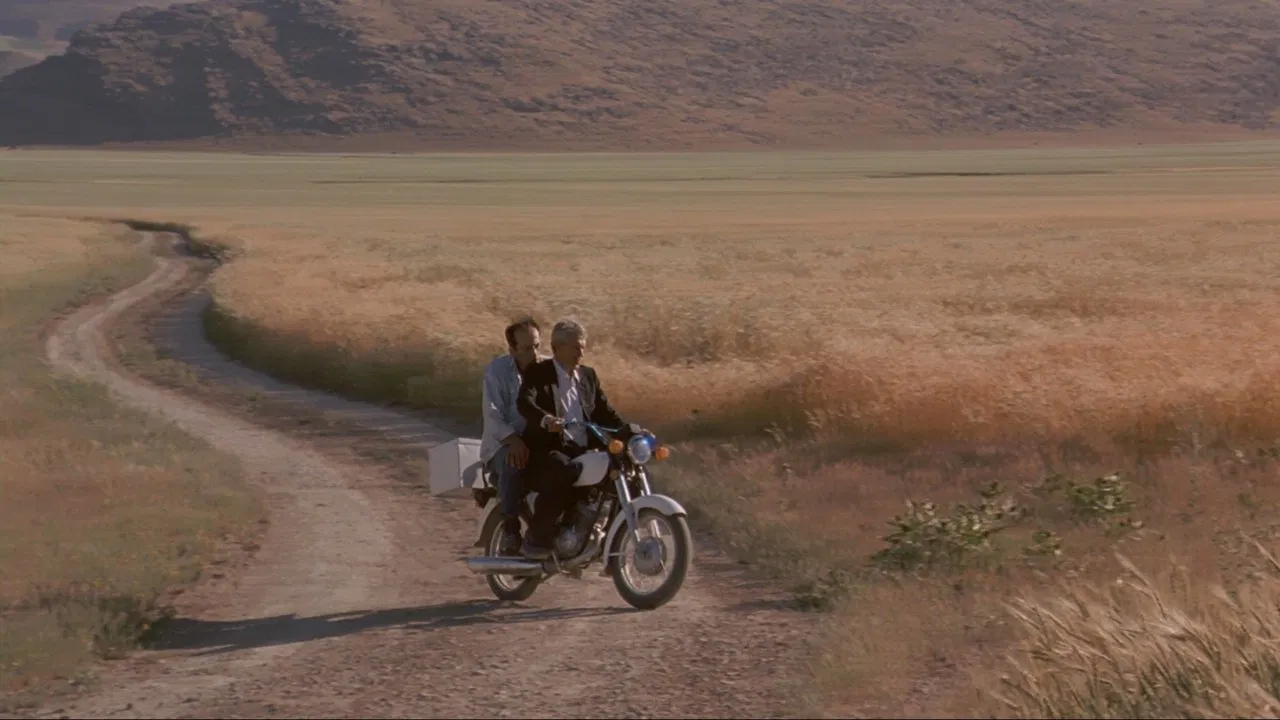 Scene from The Wind Will Carry Us (1999)