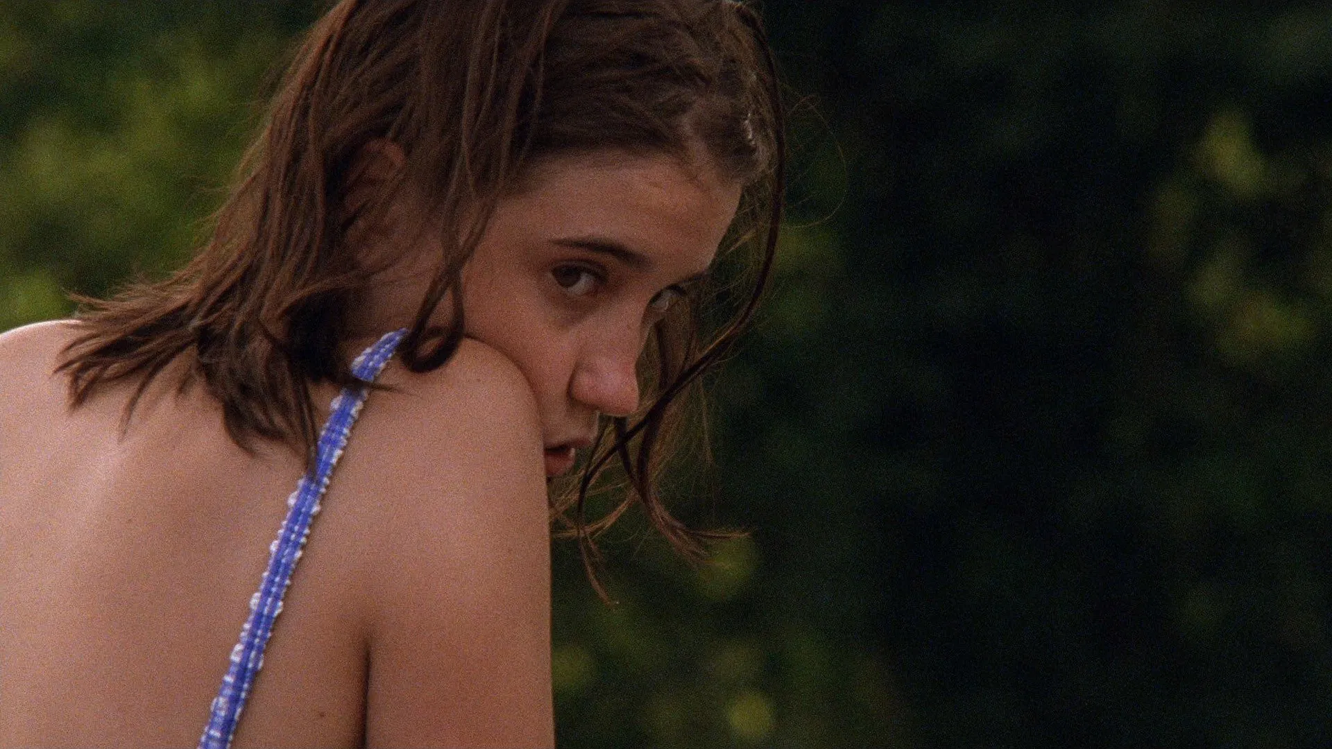 Scene from La Ciénaga (2001), illustrating the list on Top 100 curated by film magazines